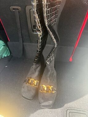 Black Suede Knee-High Boots with Gold Chain Accent
